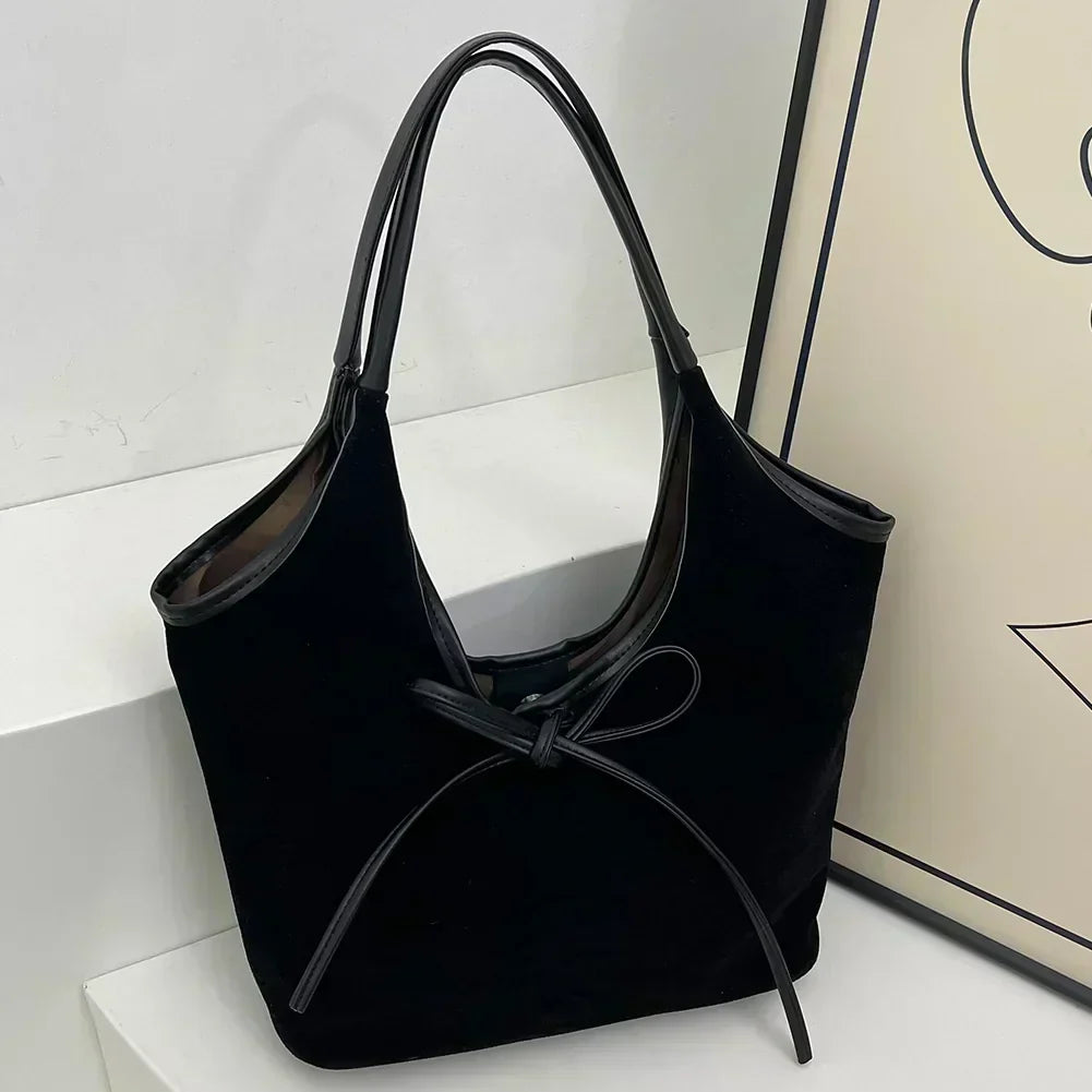 Carla™ | Borsa con fiocco
