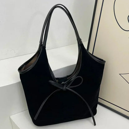 Carla™ |  Borsa con fiocco