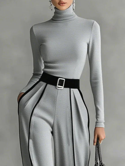 Completo 2 pezzi elegante con pantalone palazzo, cinta e top a collo alto!