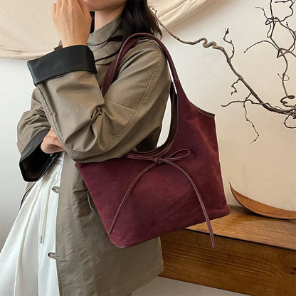 Carla™ |  Borsa con fiocco