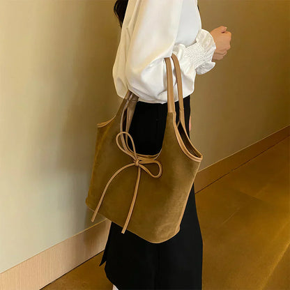 Carla™ |  Borsa con fiocco